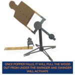 Demonstration on how the cardboard swinger target is activated.