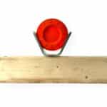 Set of five AR500 steel Clay Pigeon Brackets mounted on a 2x4 for reactive shooting